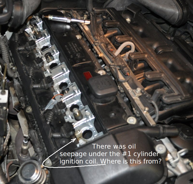 oil_seepage_under_ignition_coil_e39.jpg